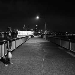 Empty walkway at night