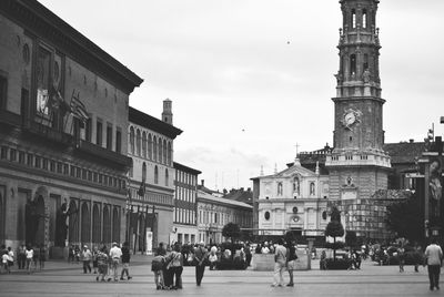 People in front of building