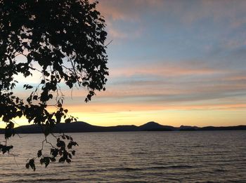 Scenic view of sea at sunset