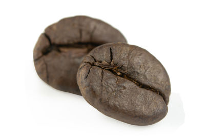 Close-up of bread against white background