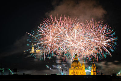 Firework display at night