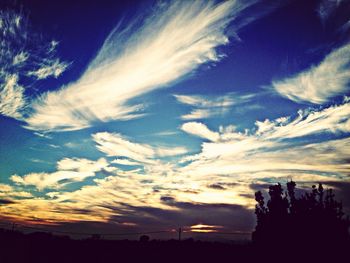 Scenic view of landscape at sunset