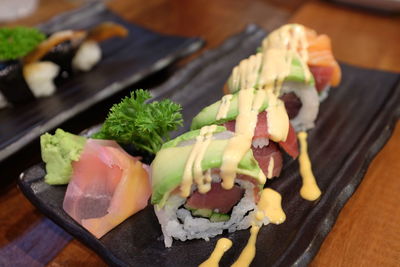 Close-up of sushi served on table