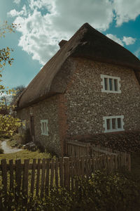 Low angle view of old building against sky