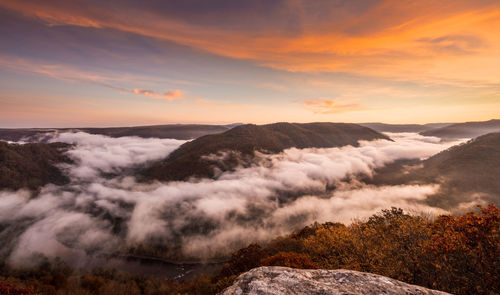 Scenic view of mountains against sky during sunset