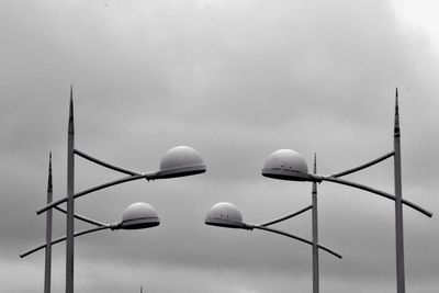 Low angle view of street light against sky