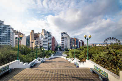 Buildings in city against sky