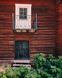 Closed door of old wooden building
