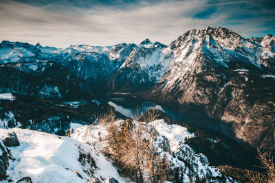 Scenic view of snowcapped mountains against sky