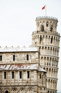Low angle view of leaning tower of pisa against clear sky