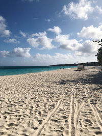 Scenic view of beach against sky