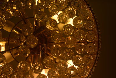 Low angle view of illuminated chandelier