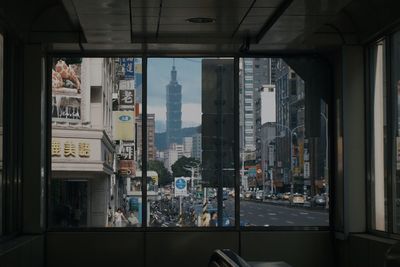 City street seen through glass window