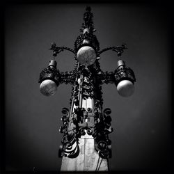 Low angle view of illuminated lamp