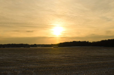 Scenic view of landscape at sunset