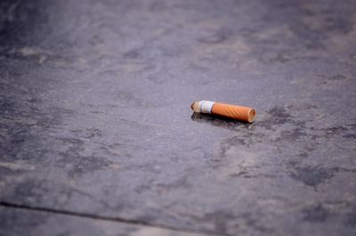 Close-up of cigarette smoking outdoors