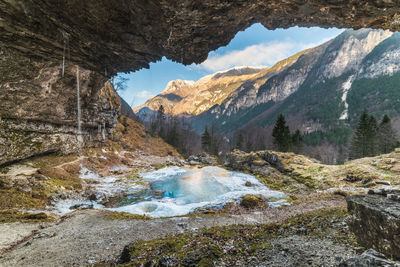 Winter. ice games in the fontanon of goriuda waterfall. friuli, italy.