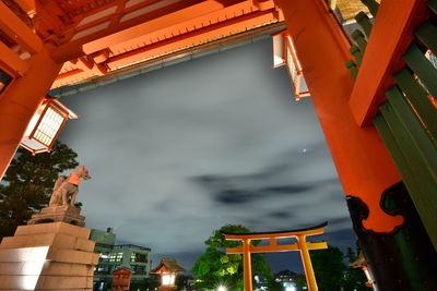 Illuminated buildings against sky