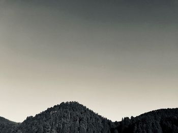 Low angle view of mountain against clear sky