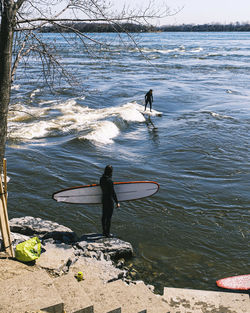 Rear view of man on sea shore