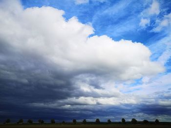 View of landscape against cloudy sky