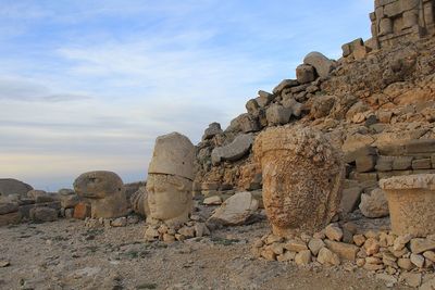 Old ruins of rock formations against sky