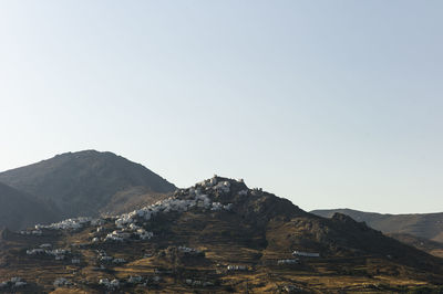 Scenic view of rocky mountains against clear sky