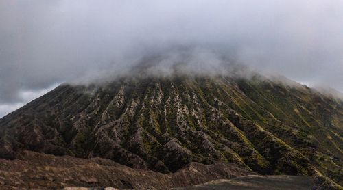 Scenic view of volcanic landscape against sky