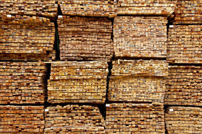 Full frame shot of stone stack on brick wall