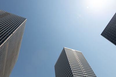 Low angle view of modern buildings against sky