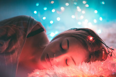 Close-up of young woman sleeping