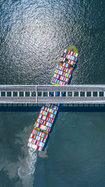 High angle view of multi colored boat in sea
