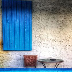 Close-up of wall against blue wall