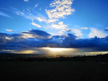 Scenic view of silhouette land against sky during sunset