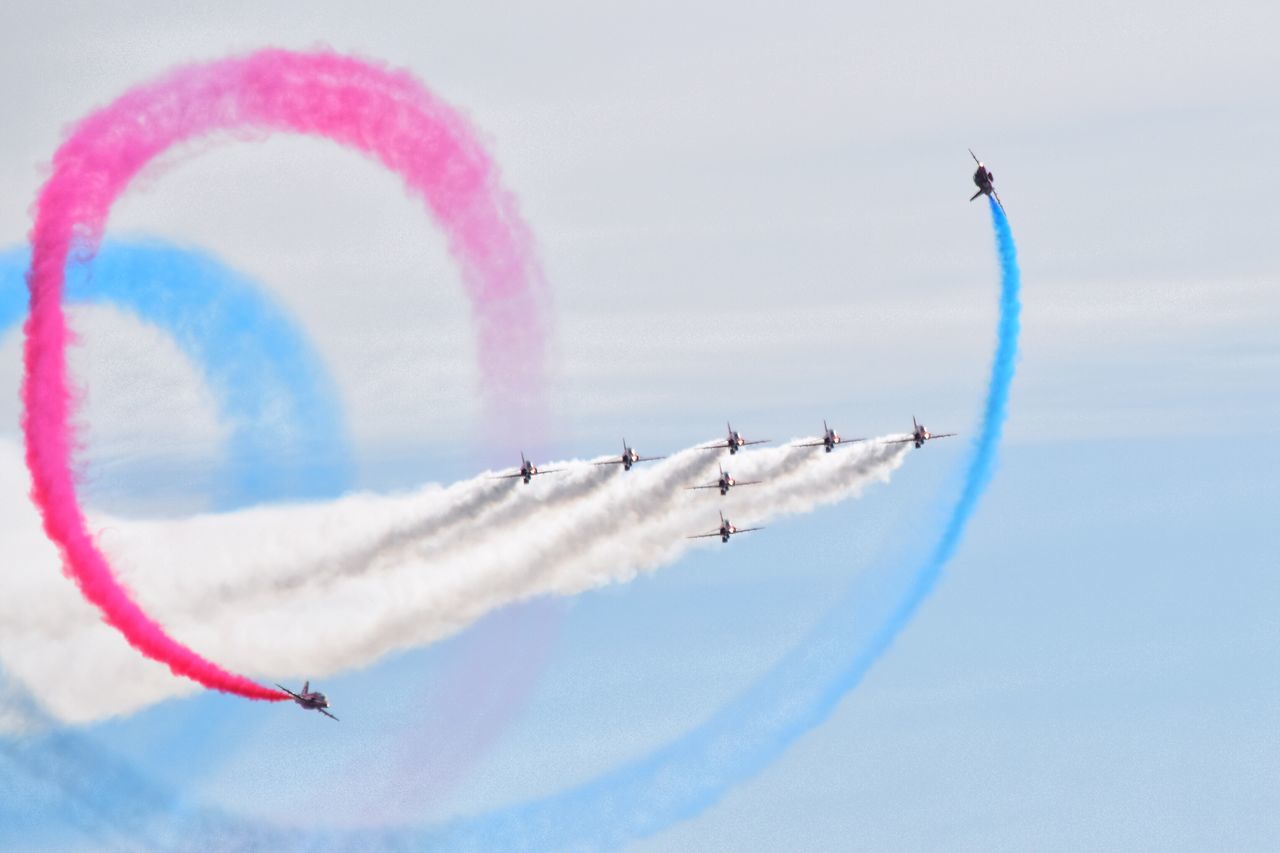 airshow, airplane, air vehicle, flying, cloud - sky, teamwork, cooperation, sky, speed, on the move, motion, plane, vapor trail, transportation, fighter plane, mode of transportation, smoke - physical structure, travel, order, no people, outdoors, aerobatics