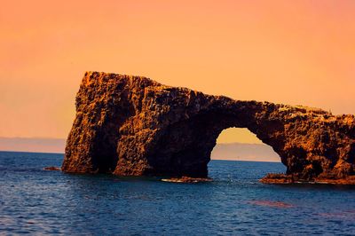 Scenic view of sea at sunset