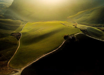 Aerial view of road amidst landscape against sky