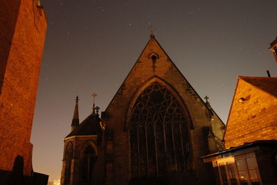 Cathedral against sky at night