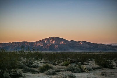 Scenic view of mountains against clear sky