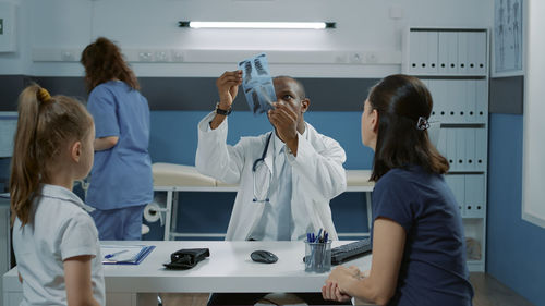 Doctor examining x-ray image in medical clinic