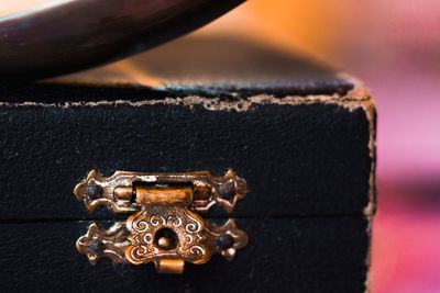 Close-up of rusty metal on table