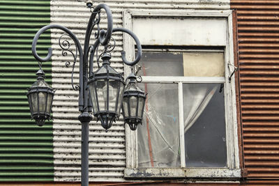 Close-up of closed metal against wall