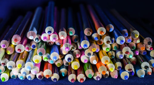 Close-up of colored pencils on table