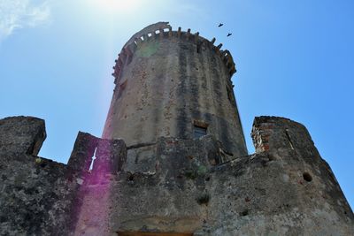 Low angle view of historic building against sky