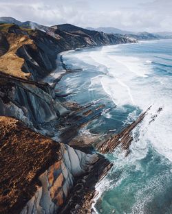 High angle view of water flowing through rocks