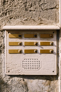 Close-up of mailbox on wall