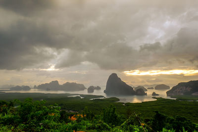 Scenic view of landscape against sky during sunset