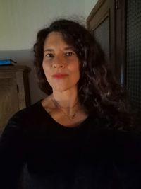 Portrait of smiling woman at home