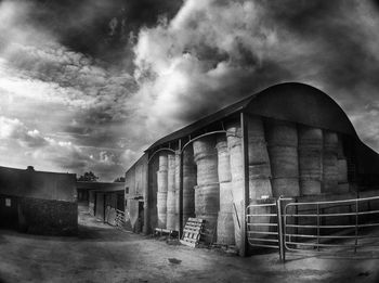 Built structure against cloudy sky