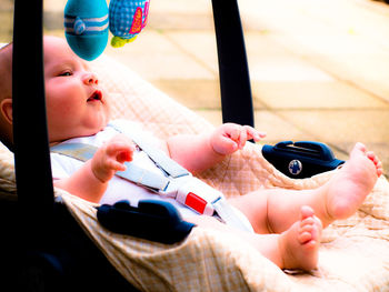 High angle view of baby in carriage